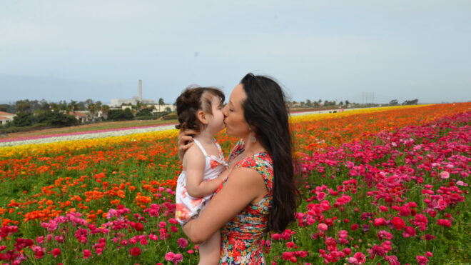 woman-child-flower-field