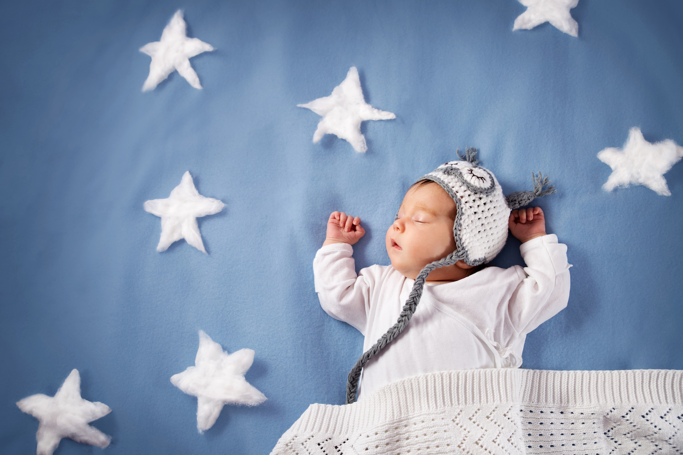 Baby surrounded by stars