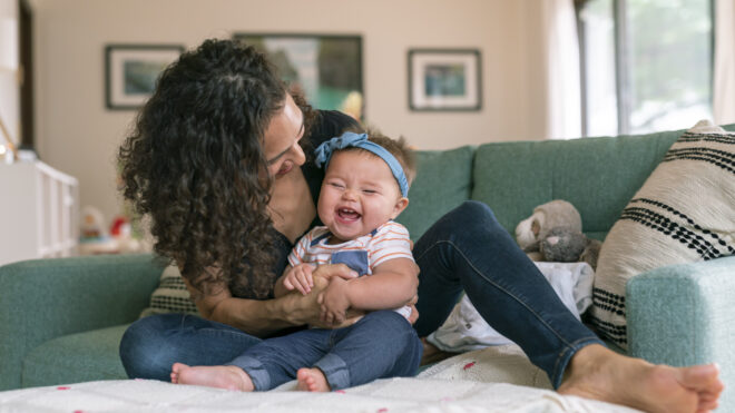 mom playing with baby