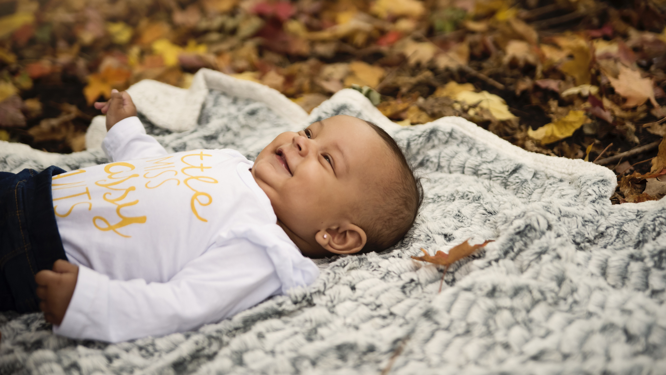 Baby on a blanket outside