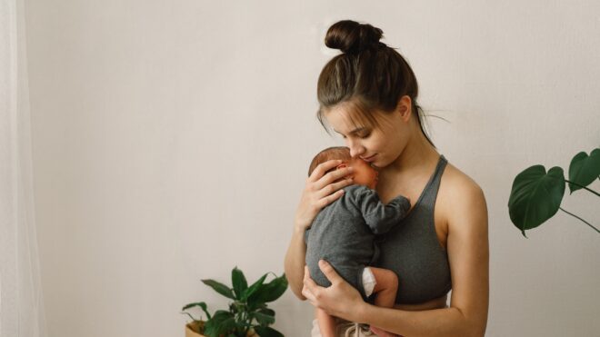 Woman holding newborn