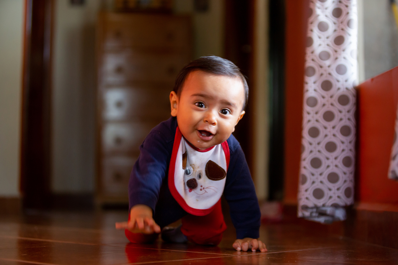 Baby crawling very happily