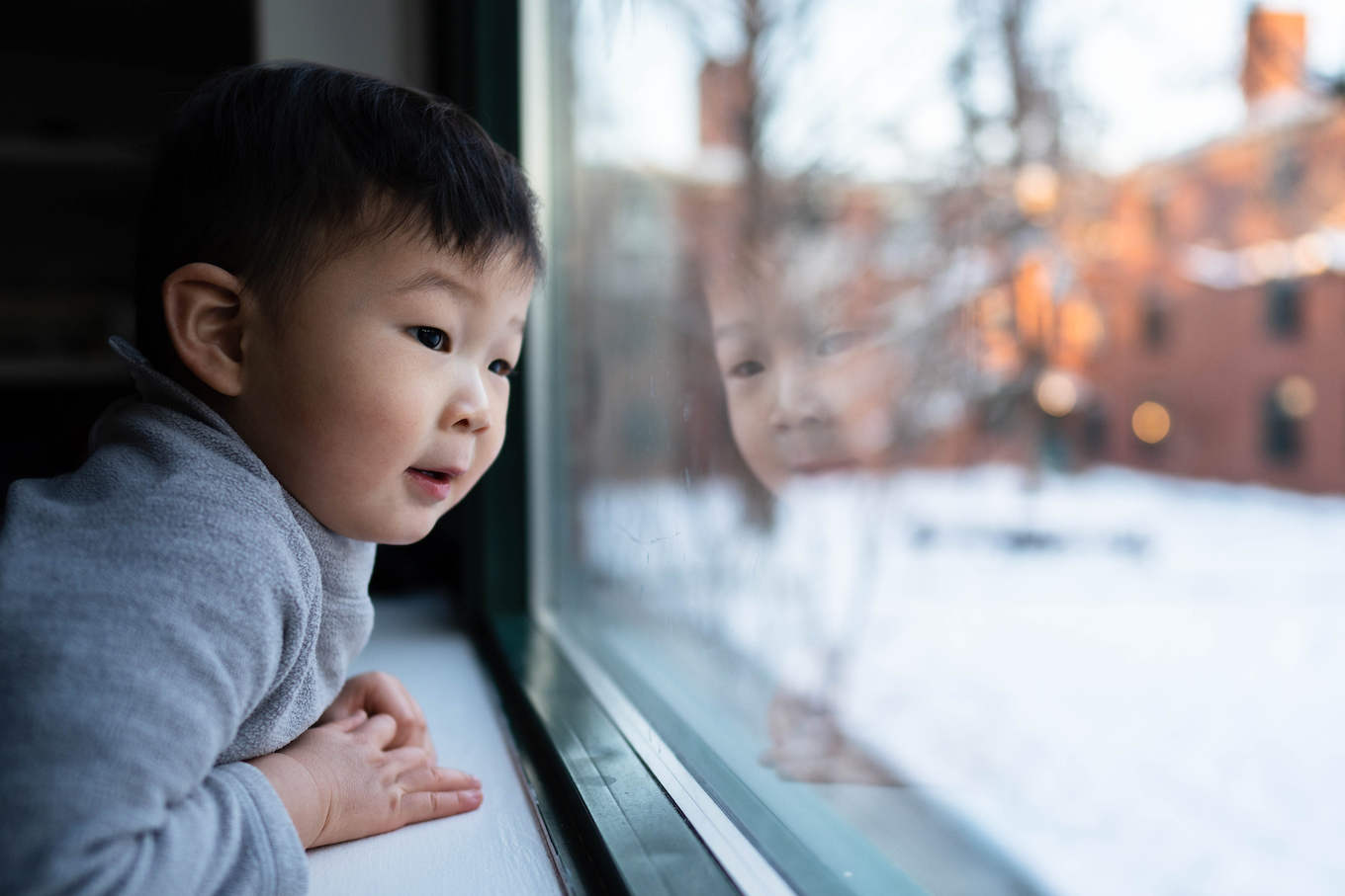 Boy looking out the window