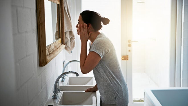 woman bathroom mirror
